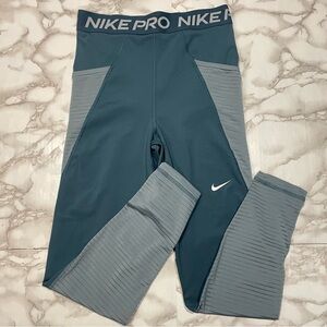 Nike Pro Training Seasonal Dri-Fit High Rise Leggings in Blue
